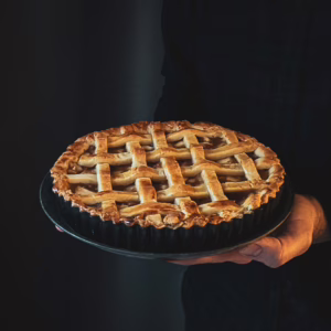 Fabio holding plate with Venetian apple tart