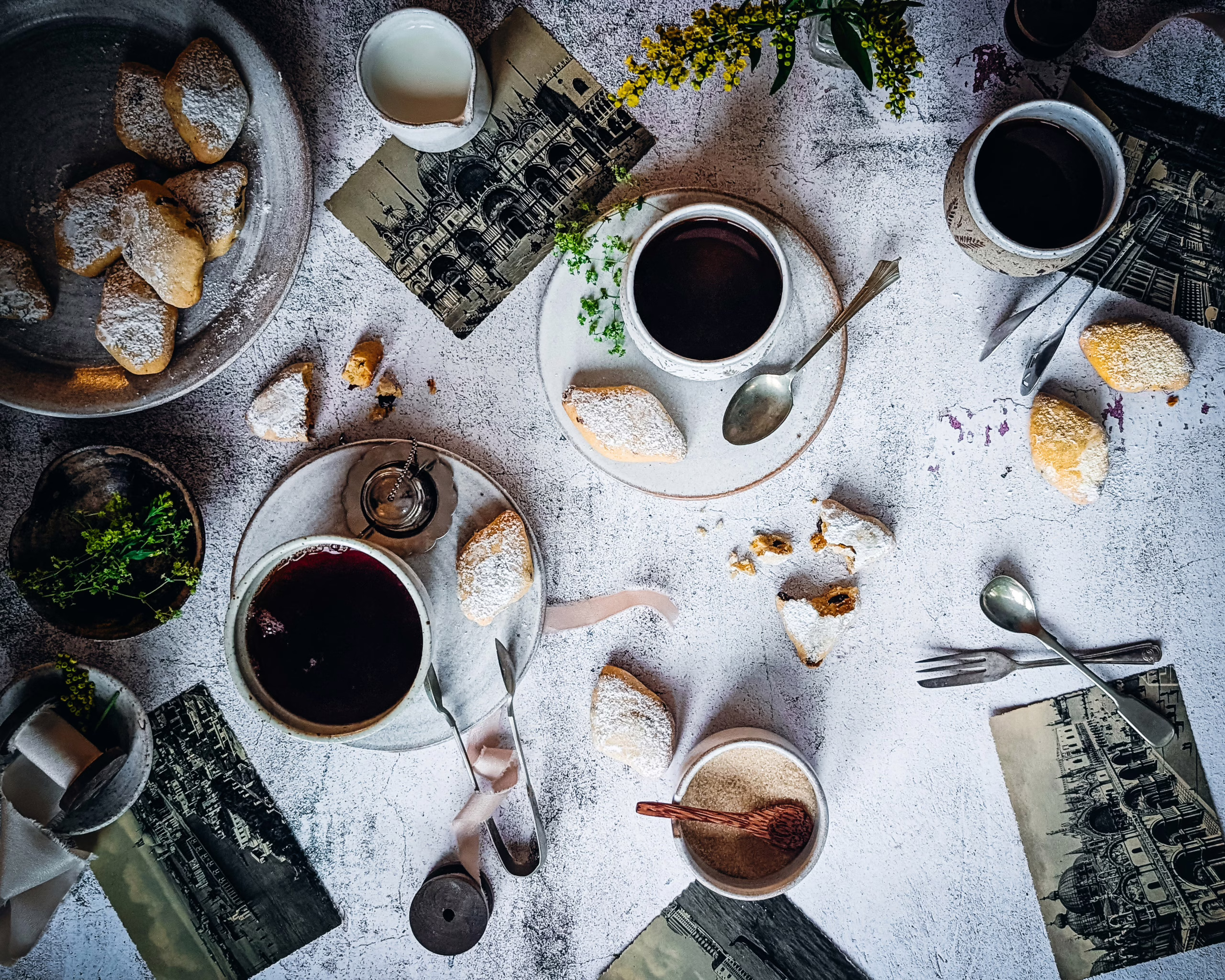 Zaeti being served with coffee and tea