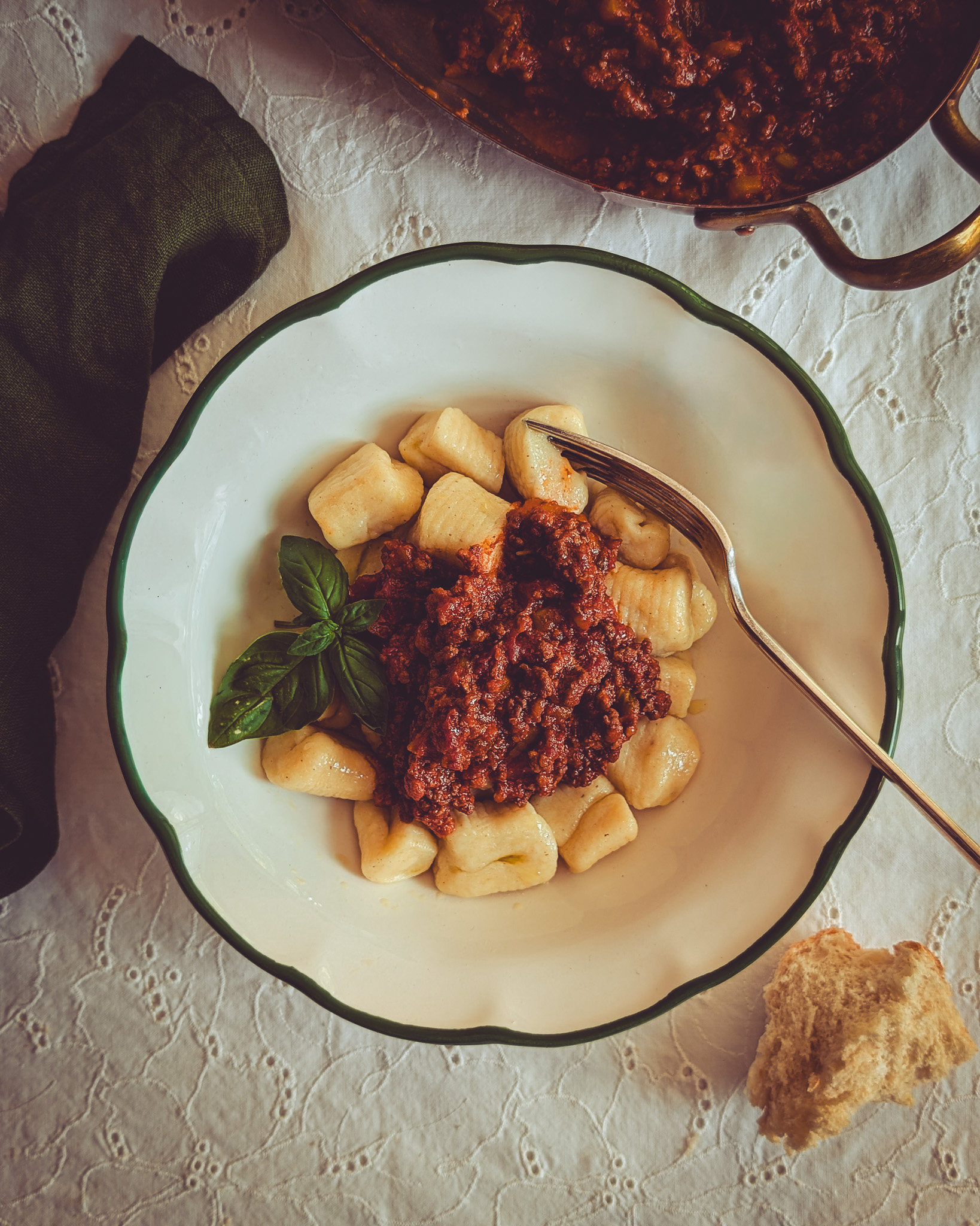Close up of a plate full of gnocchi al ragu