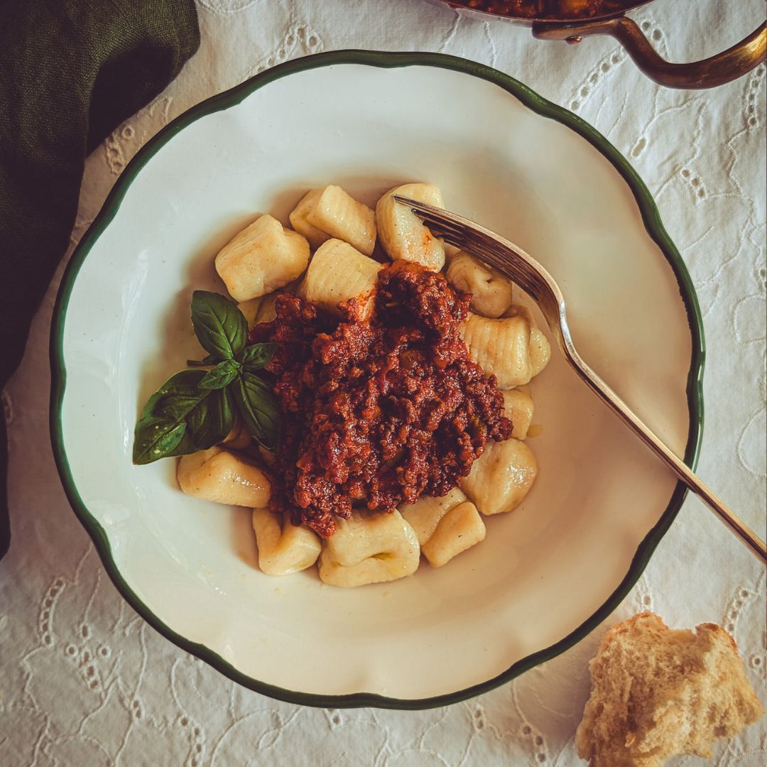 Plate full of gnocchi al ragu