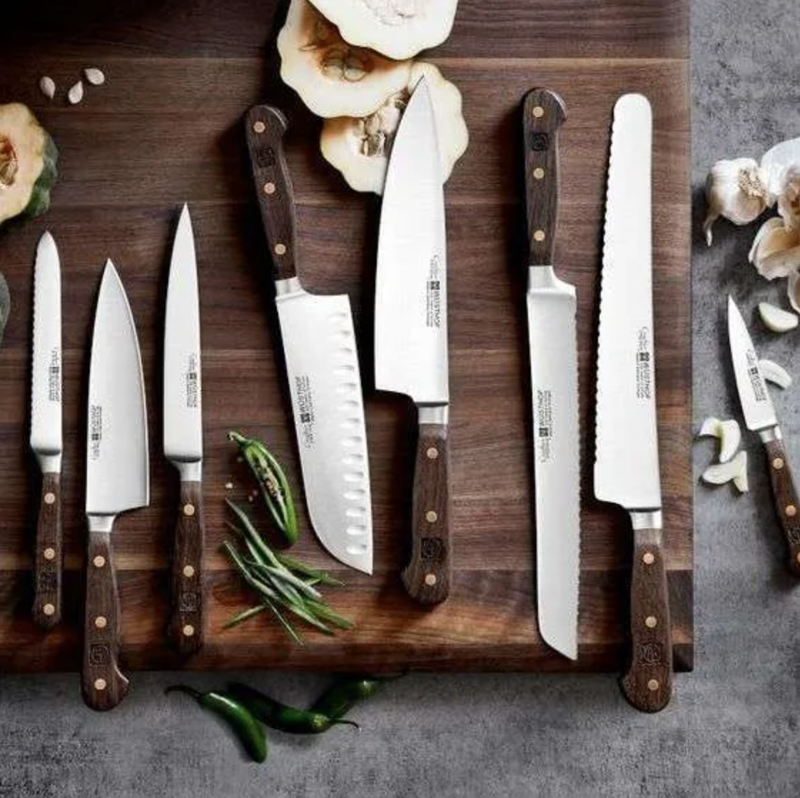 Set of knives on a chopping board